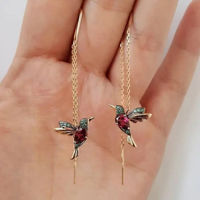 Amalia - Trådøreringe med kolibri i guld og krystaller