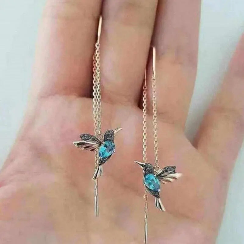 Amalia - Trådøreringe med kolibri i guld og krystaller